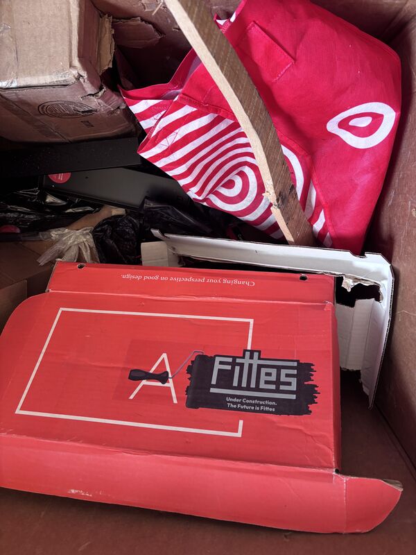 Red Fiitas branded box and red striped fabric