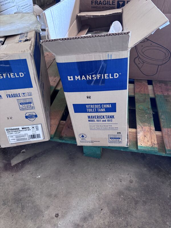 Mansfield toilet tank boxes on a pallet