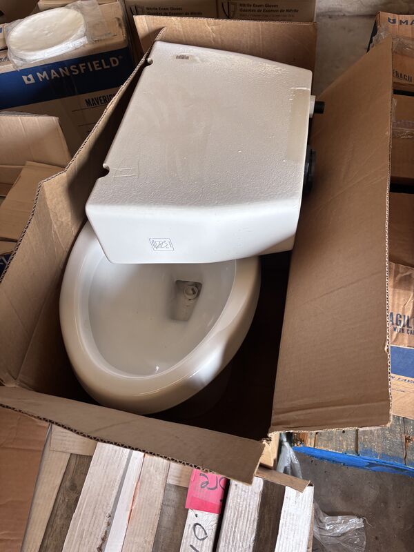 Almond toilet bowl and tank in box